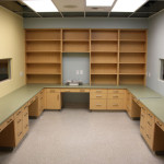 Exam room with counters and shelving