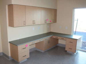 Exam room with counters and closed cupboards