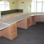 Reception area with curved wood partition