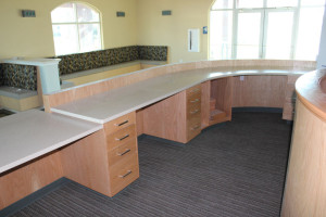 Reception area with curved wood partition